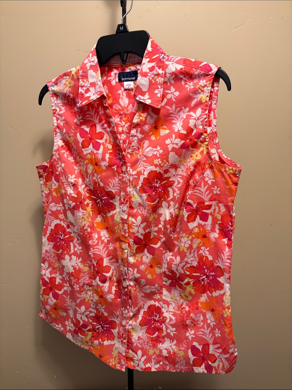 Basic Editions sleeveless button up blouse.